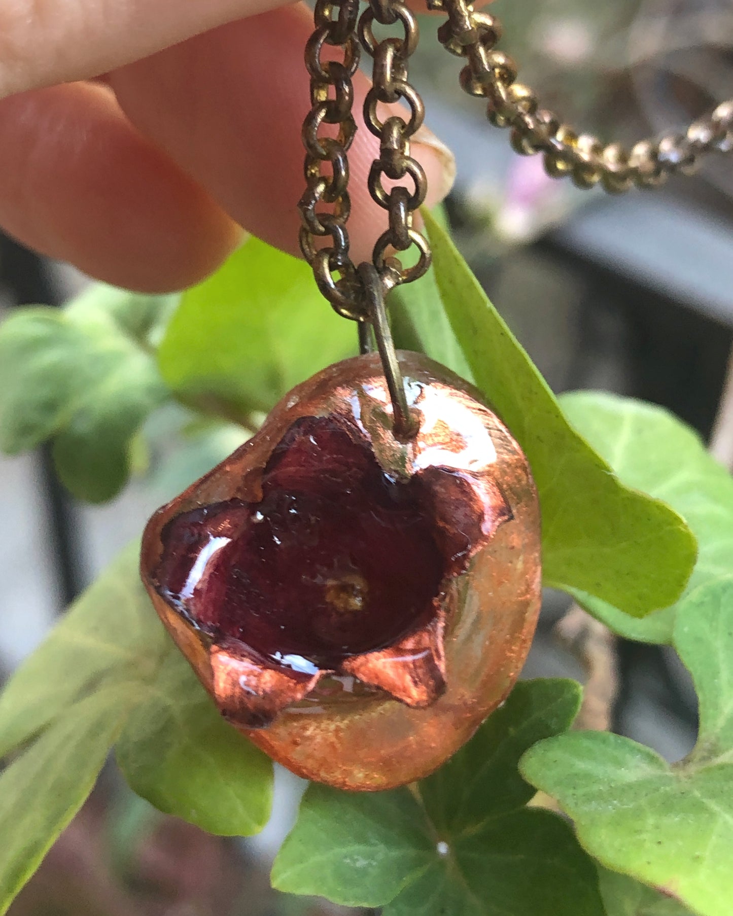 Borne flower pendant