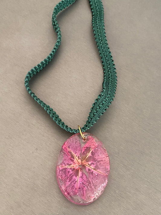 Oval flower pendant from the port of Barceloneta.
