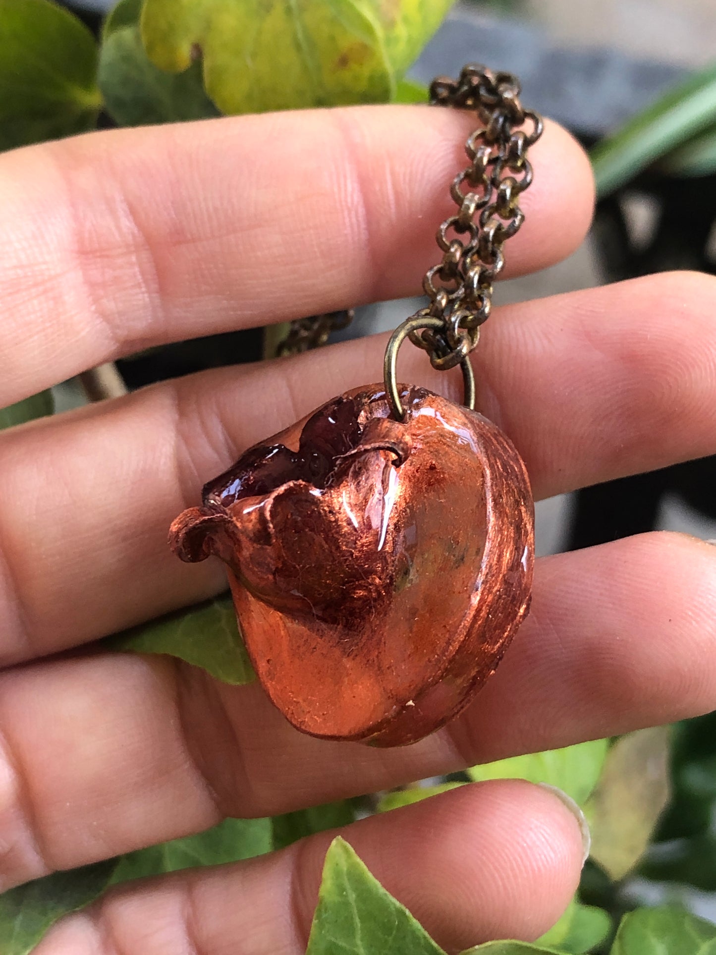 Borne flower pendant