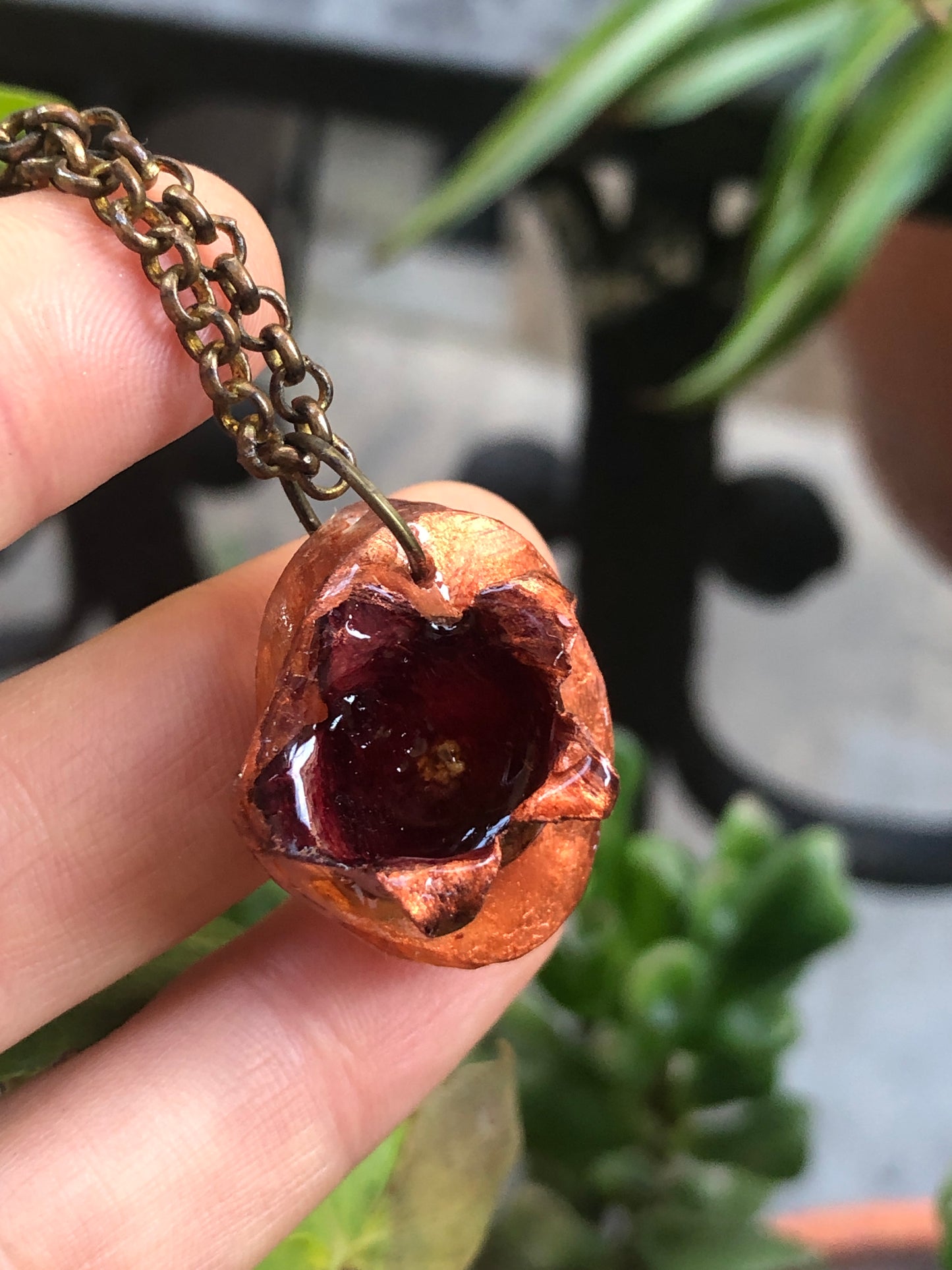 Borne flower pendant