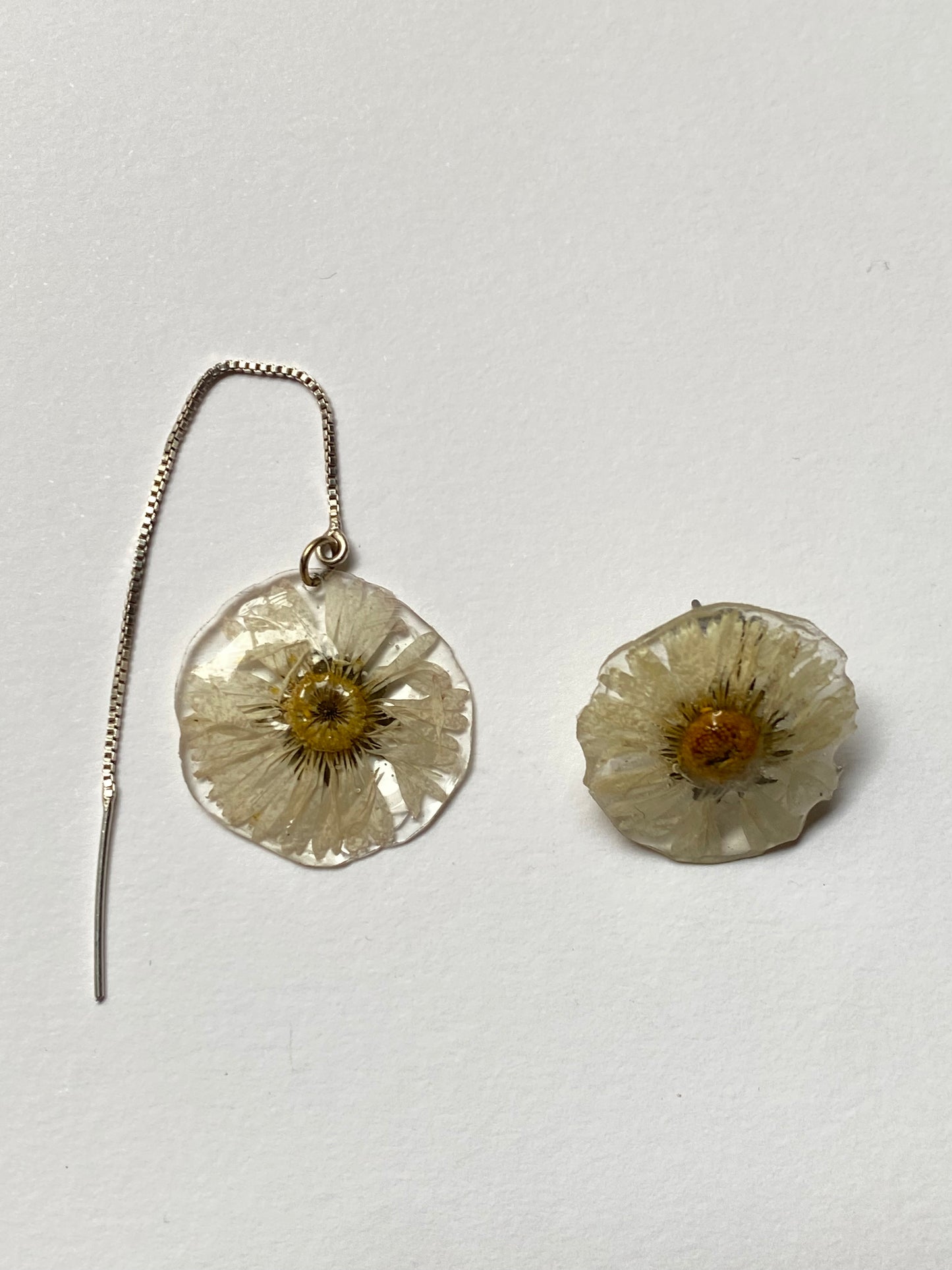 Pendientes asimétricos